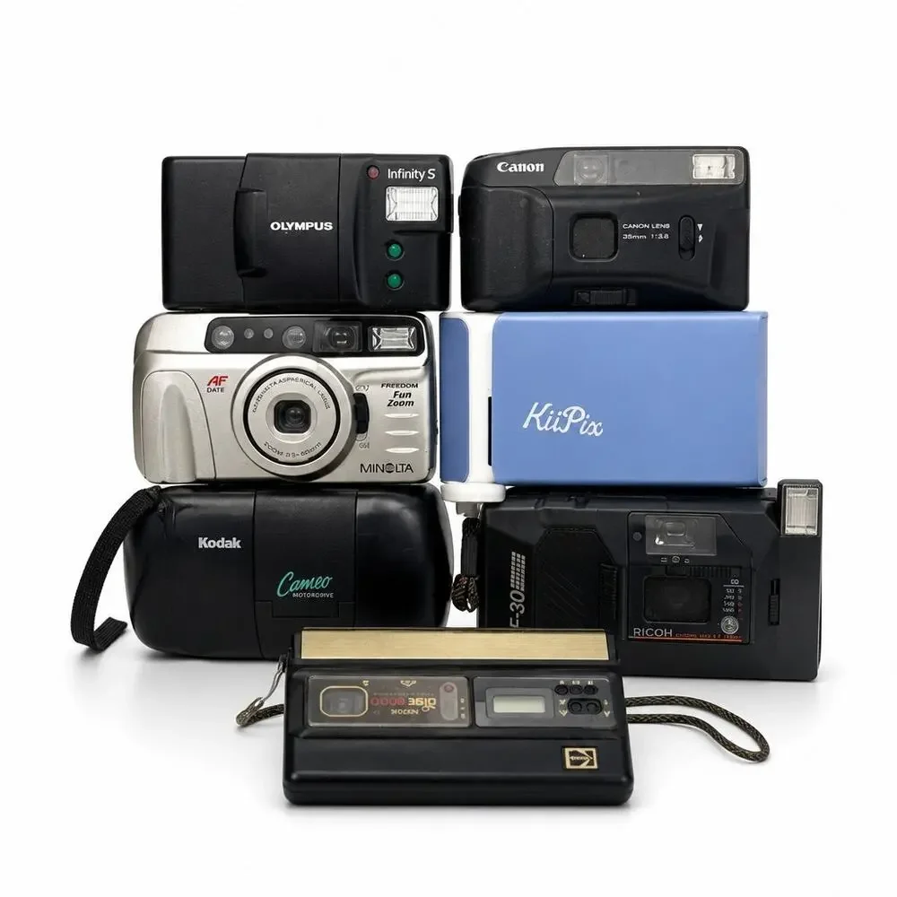 Lot of 7 Vintage 35mm Point & Shoot Camera Lot Olympus Canon Kodak Ricoh